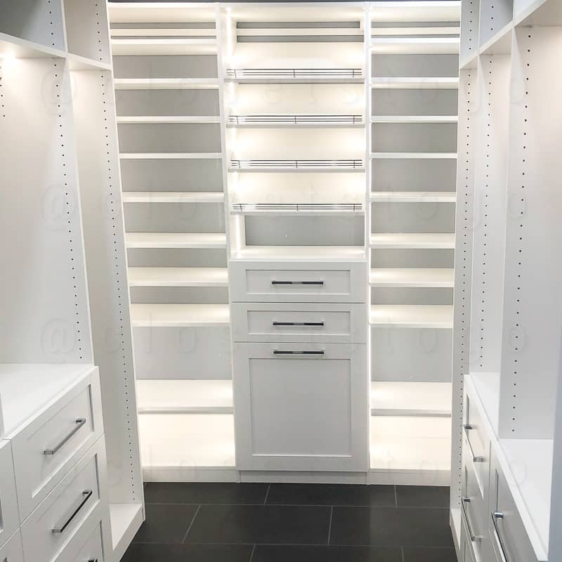 This floor based closet is lit from head to toe and highlights many wardrobe items.