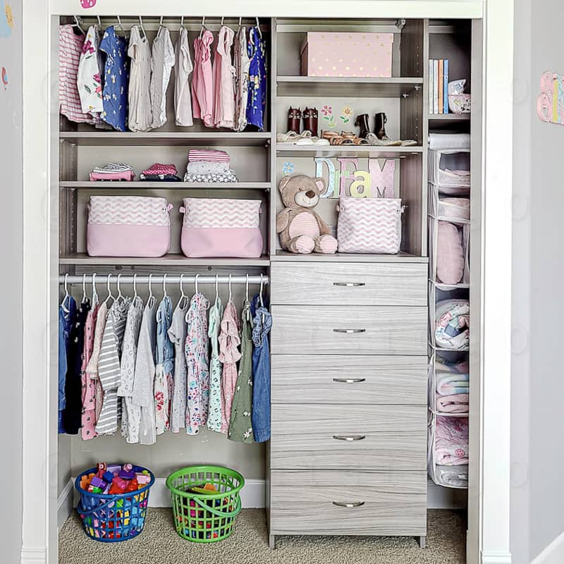 Reach in kids closet and adjustable shelves and hanging rods.