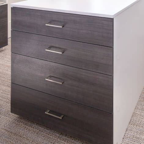 close up of the closets island that has four drawers