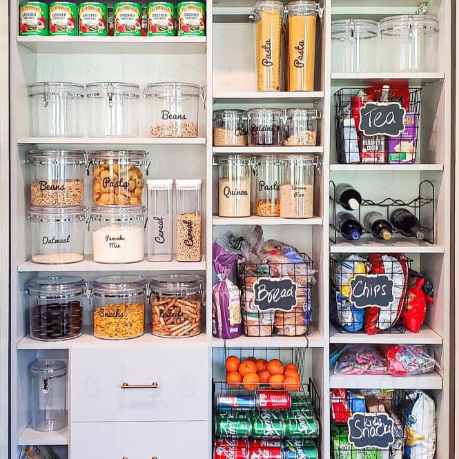 View of the pantrys shelf, baskets and drawers.