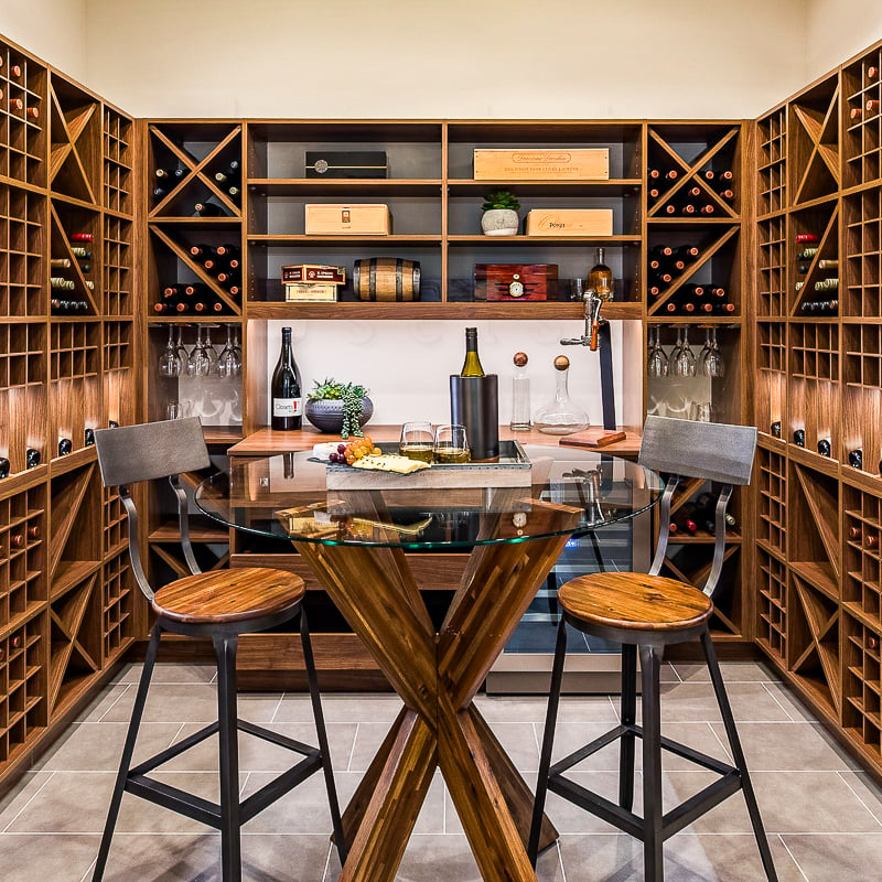 Walnut wine walk in closet with abundant room for bottles