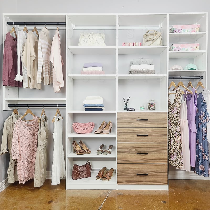 Reach in closet with shelves, drawers and medium hang.