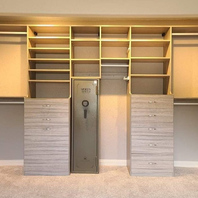 Reach-in closet with cusom safe space.